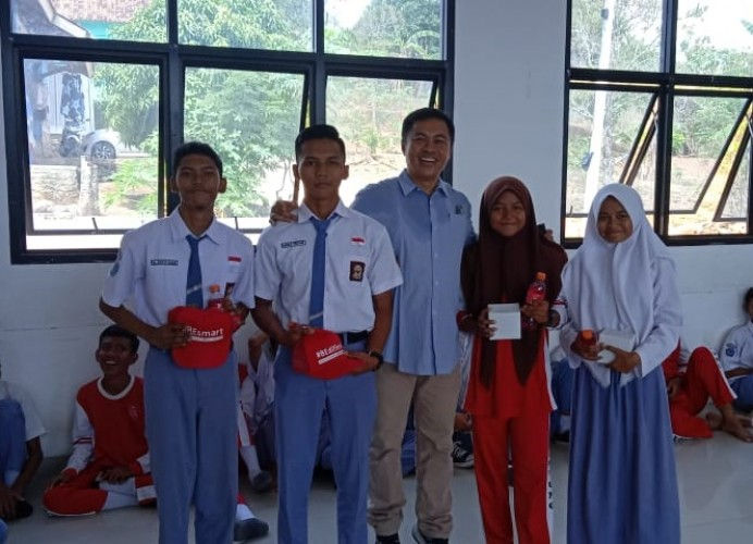 Mobile Coke Tour Bangun Energi Positif Siswa SMKN 9 Bandar Lampung 