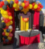 backdrop with table set up and garland