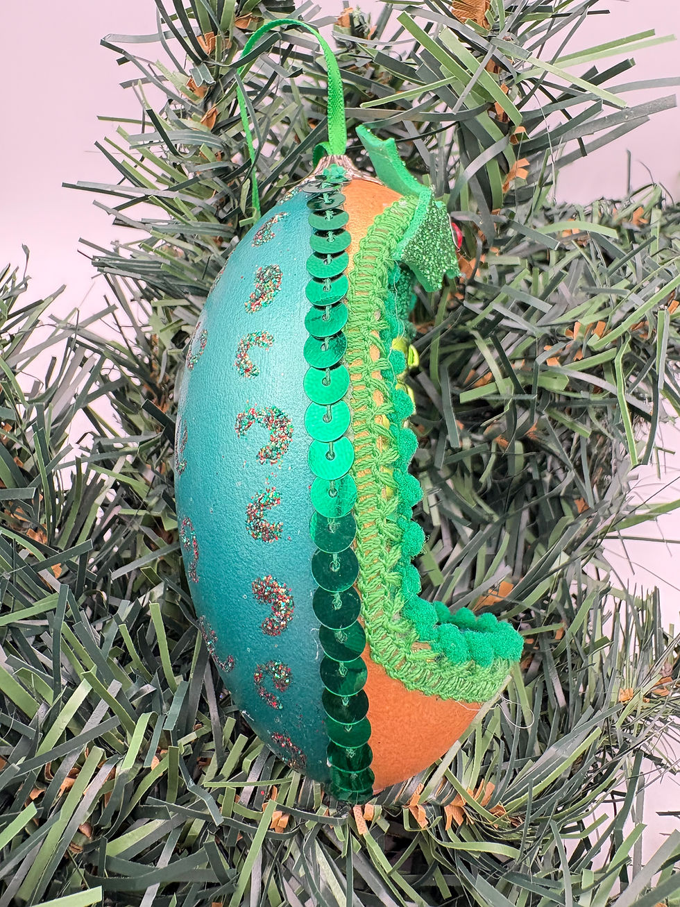 Thumbnail: Green Nutcracker with Present Goose Egg Ornament