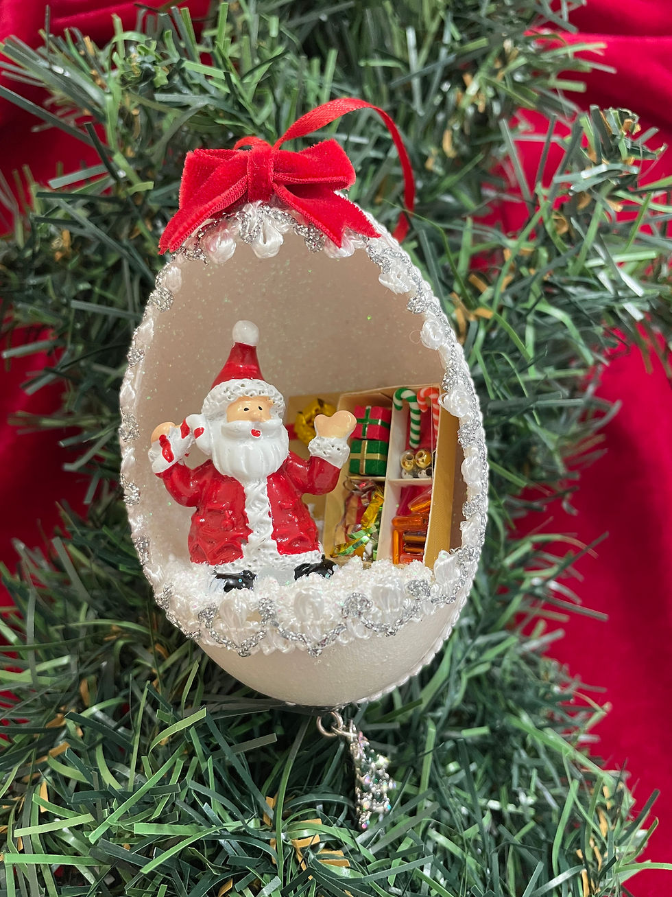 Santa Christmas tree ornament with gifts