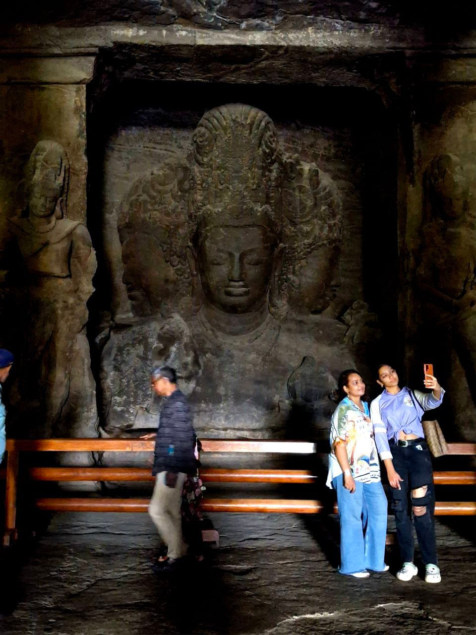 Eye-level view of Trimurti sculpture in Elephanta Caves