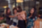 laughing-diverse-women-proposing-toast-in-restaura-2022-04-18-23-59-09-utc.jpg