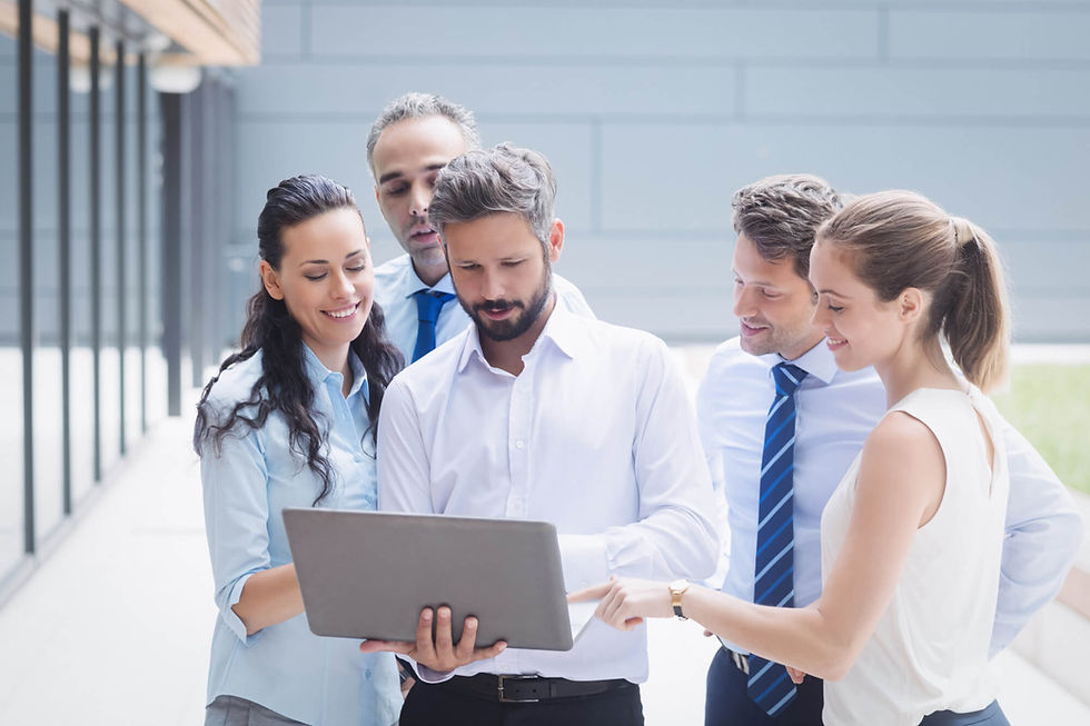 businesspeople-discussing-laptop.jpg
