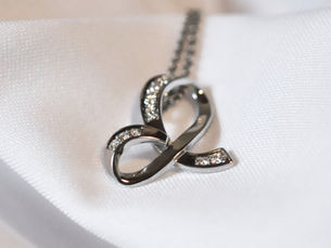 D E Diamond and Platinum Pendant