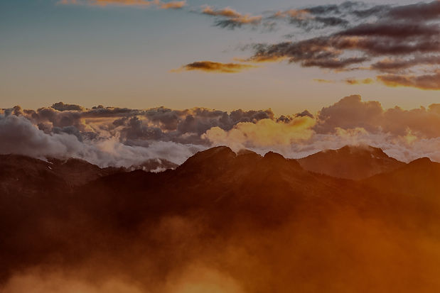 Orange clouds over mountains_edited.jpg