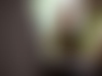 Image of smiling male wearing glasses