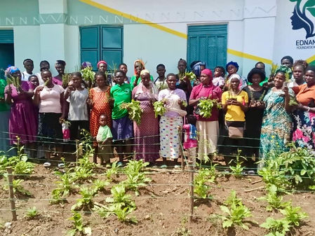 Women learning how to grow vegetables using small plots—building food security, income, and dignity from local resources.
