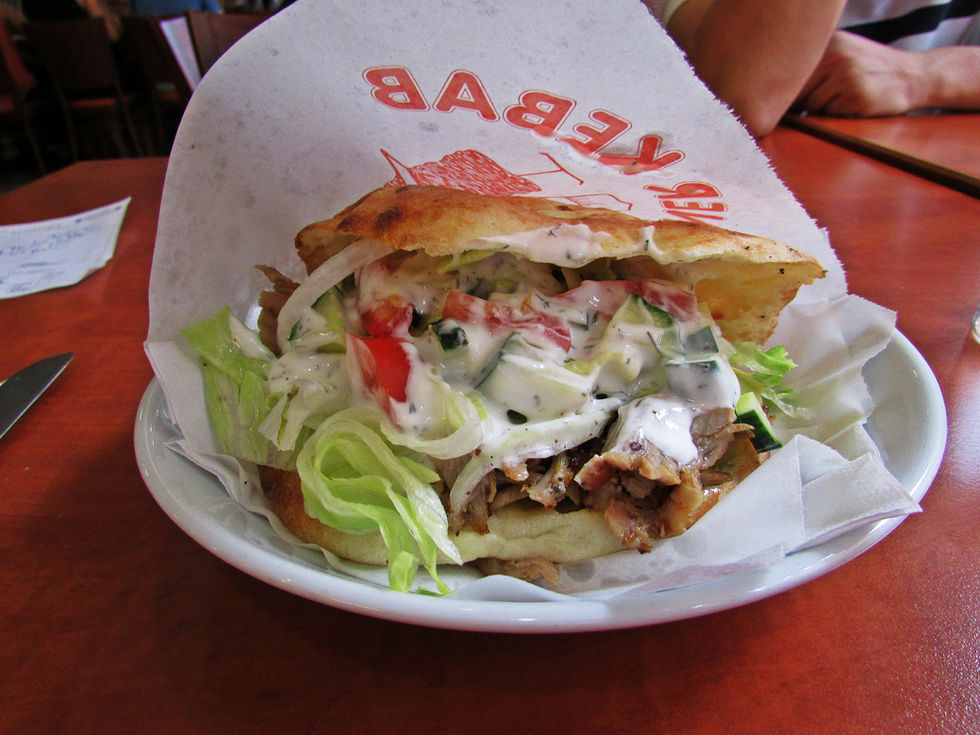 Eating Doener Kebab In Germany