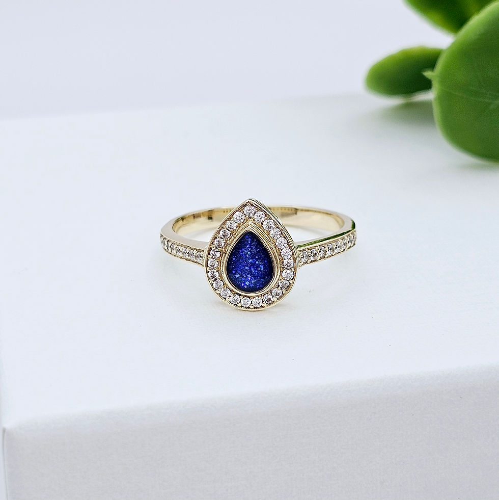 Thumbnail: Crystal teardrop memorial ring in solid gold for cremation ashes and hair. Created by Healing Hearts Memorial Jewellery UK.