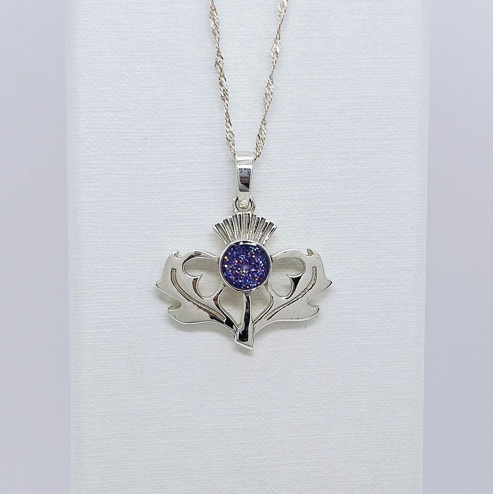 Thumbnail: Thistle memorial pendant in sterling silver, suitable for cremation ashes, hair or for use as a memorial keepsake.