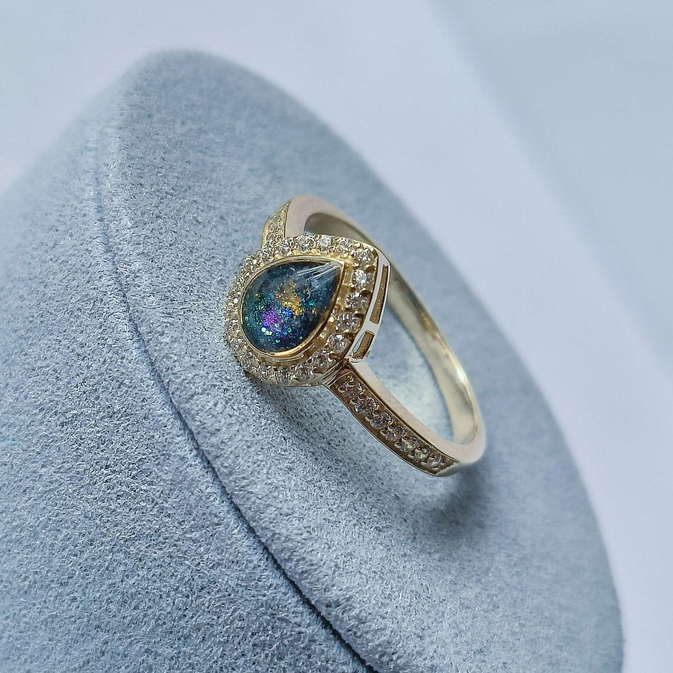 Thumbnail: Crystal teardrop memorial ring in solid gold for cremation ashes and hair. Created by Healing Hearts Memorial Jewellery UK.