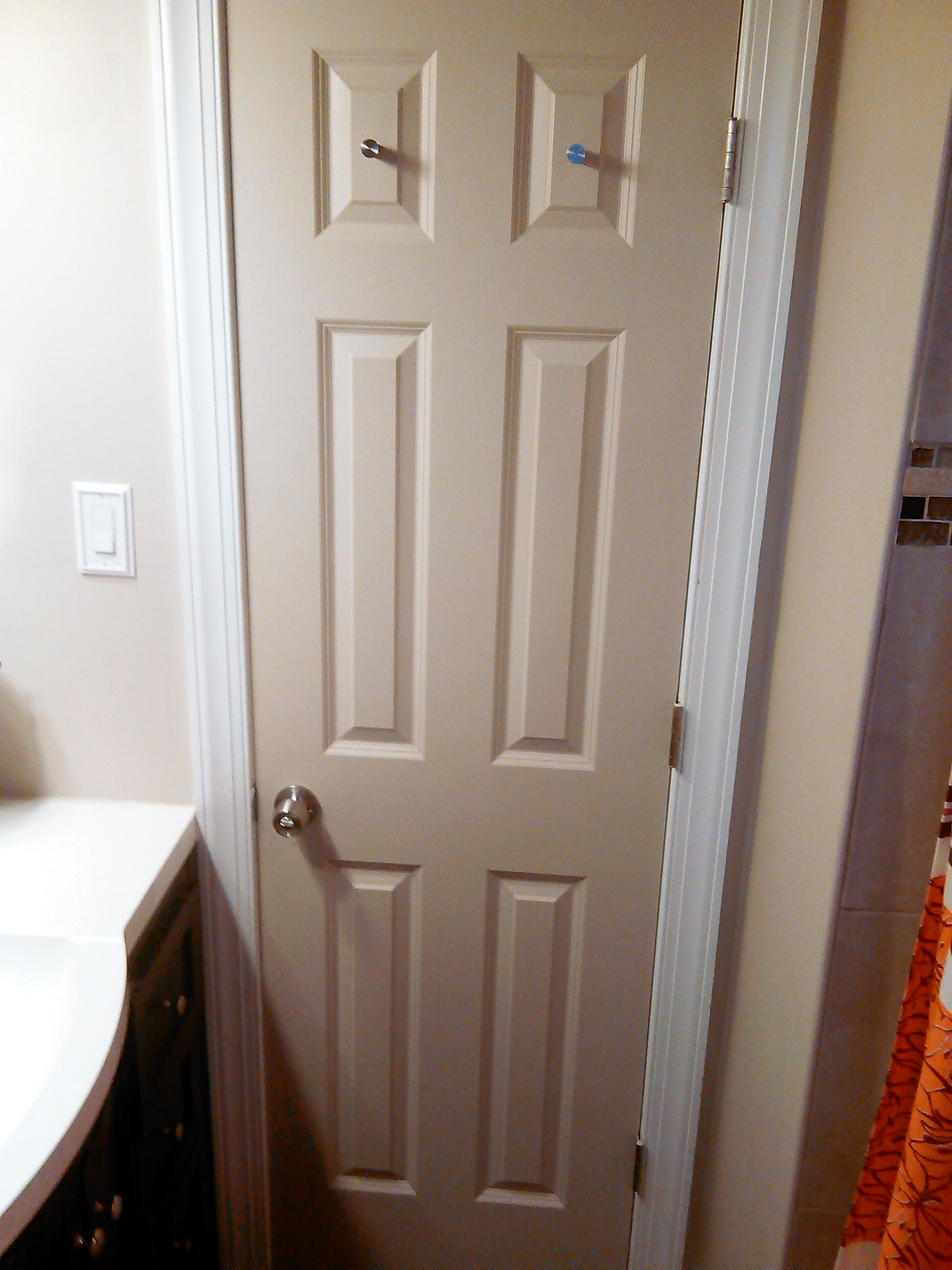 Door the same color as the walls
