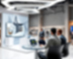create an image of graphic designers in a studio meeting with a client to discuss their ne