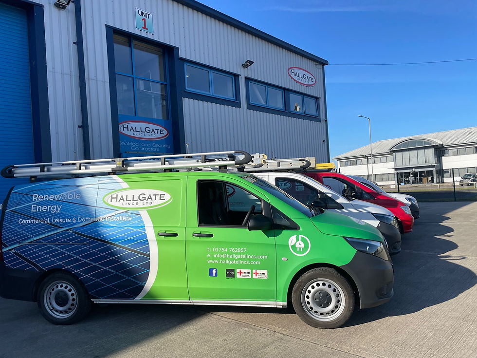 Company vans outside of a warehouse