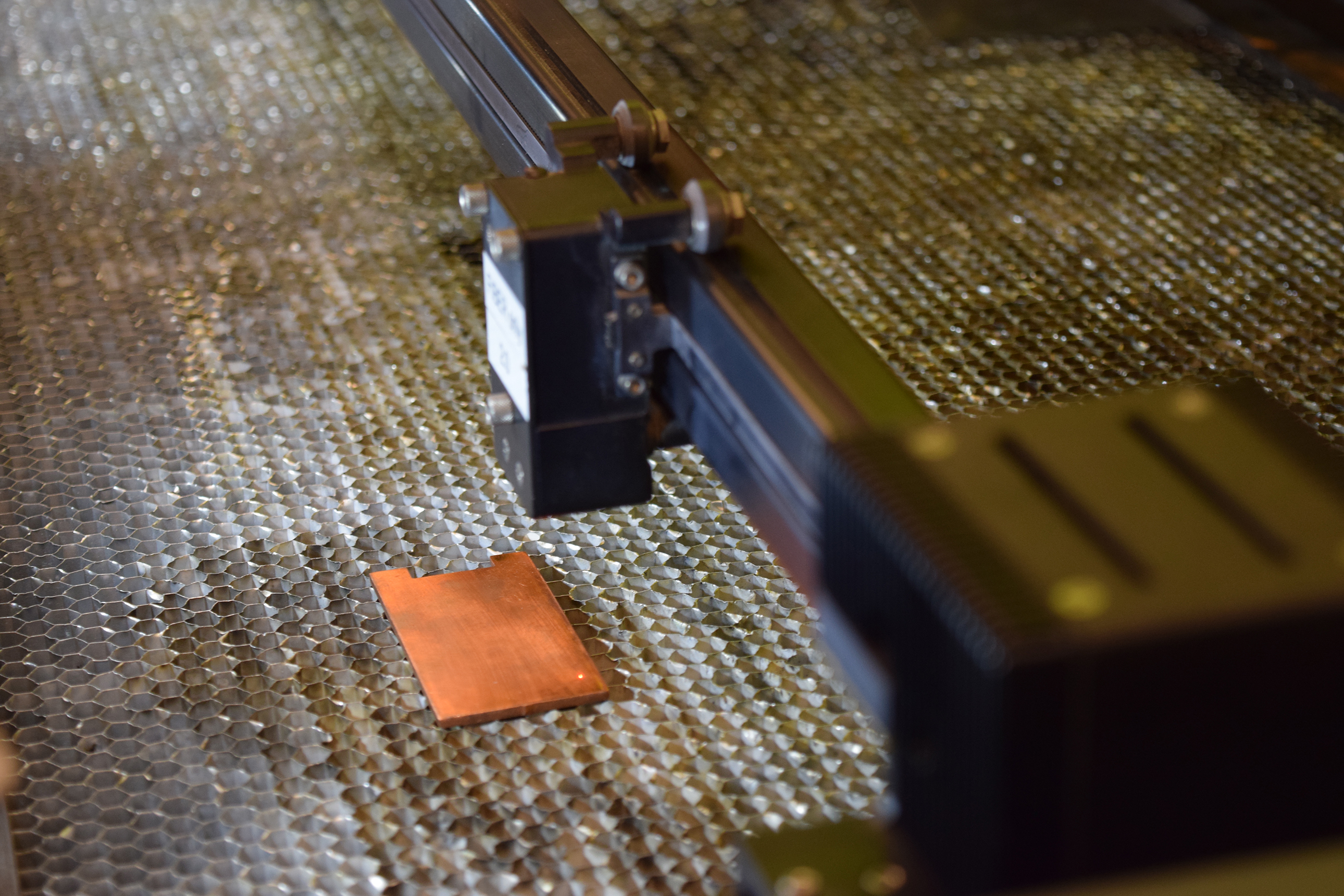 A laser prepares to texture the surface of copper, enhancing its antimicrobial properties. @ Purdue University photo/Kayla Wiles