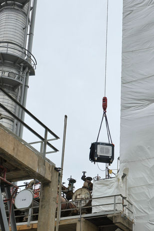 A-LUX Laser lifted with crane.
