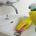 cleaning-bathroom-sink-GettyImages-dv1449036-566b487a3df78ce16163bfba.jpg