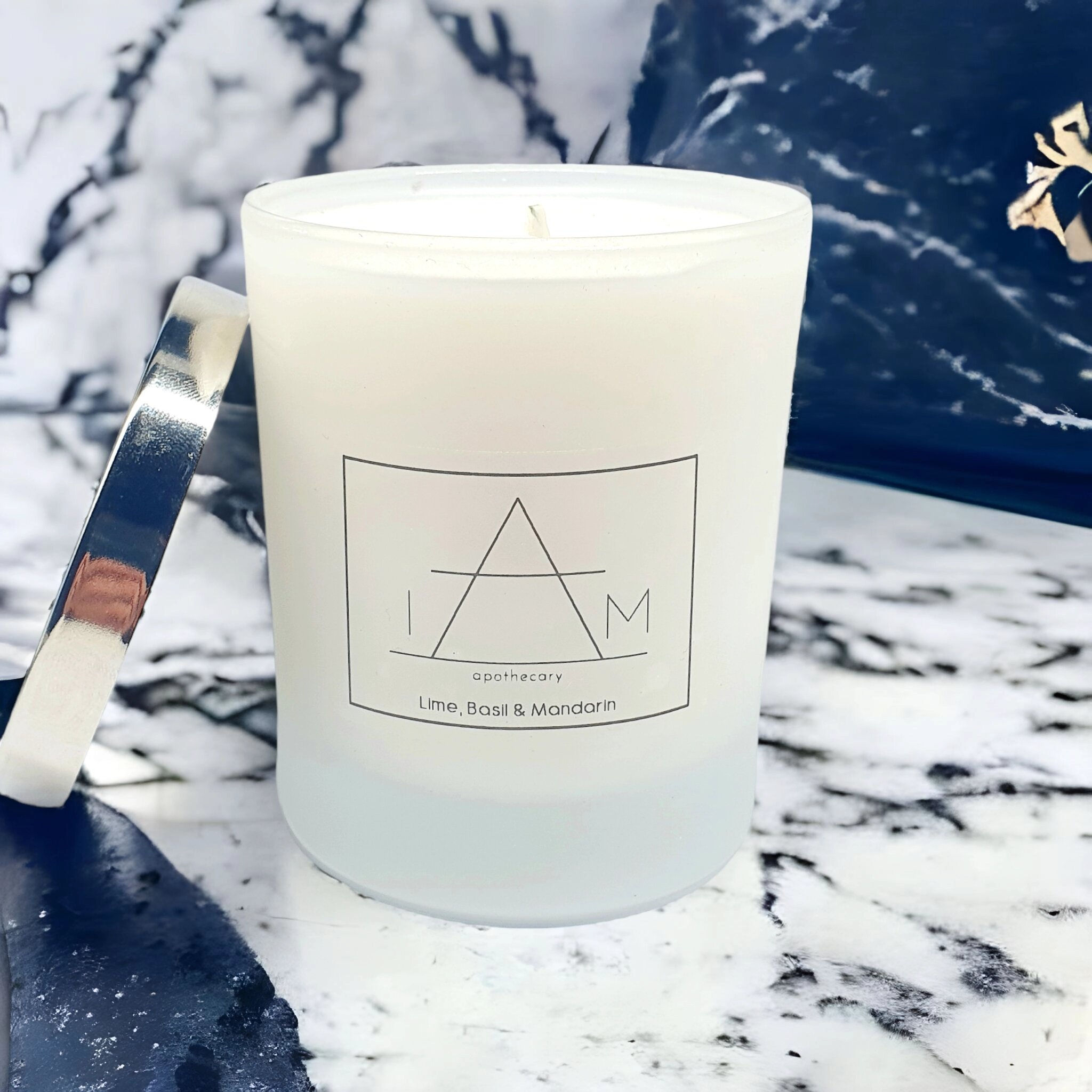 Lime Basil & Mandarin medium natural soy wax candle in frosted glass with silver lid