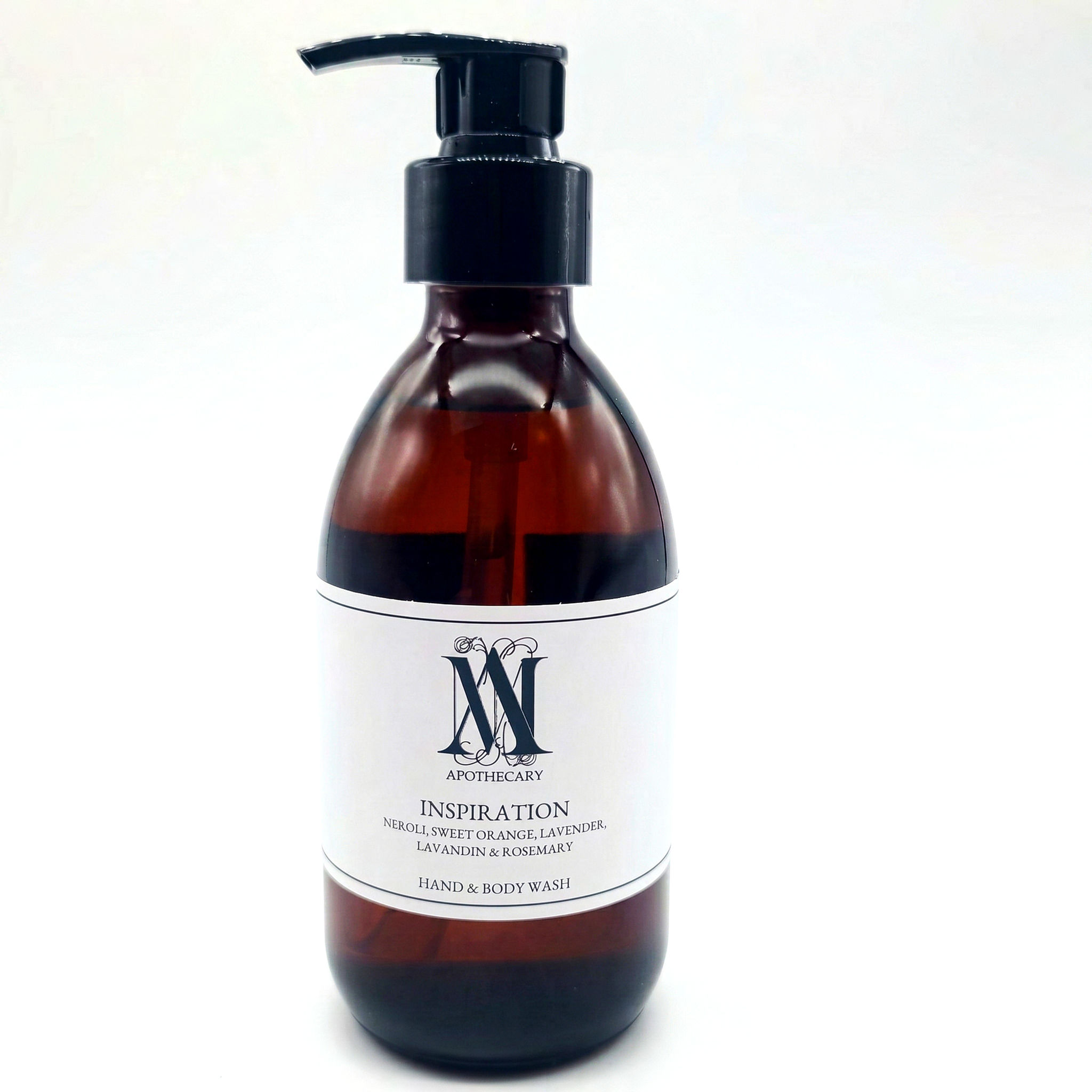 Inspiration essential oil hand and body wash in an amber glass bottle