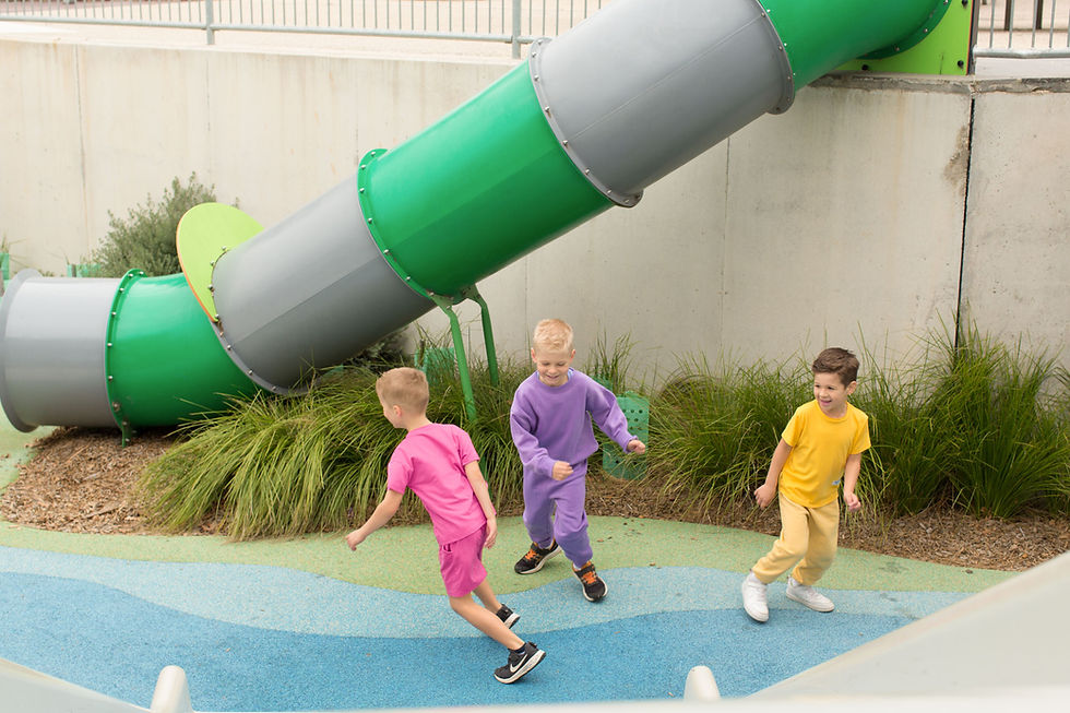 Children wearing bright coloured coord clothes