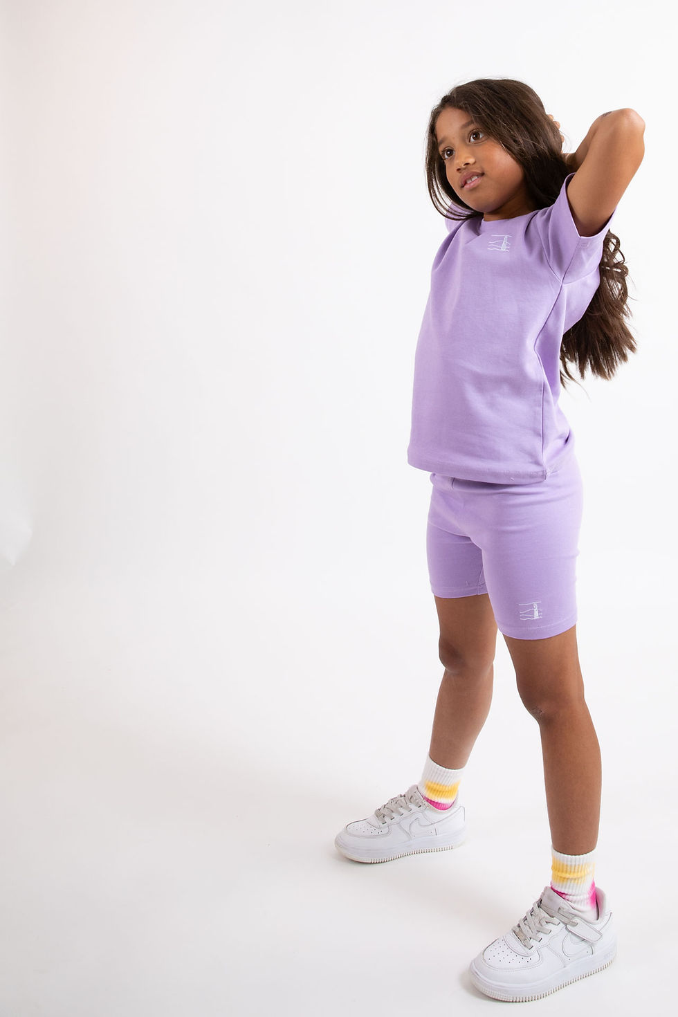 Thumbnail: Girl wearing Purple T-shirt and Bike Short Set