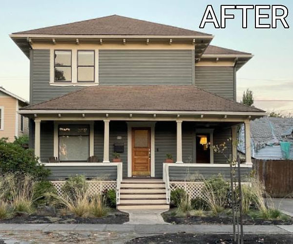 Two‑story home with gray siding and white trim in Mount Pleasant, TX shown after exterior painting and staining completed by Divine Layers.