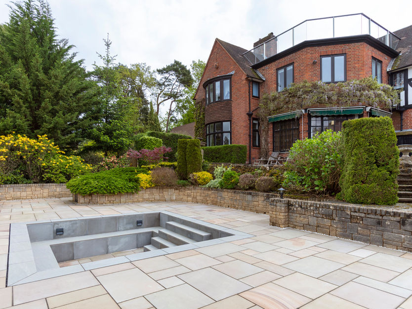 Patio with pool, large house, trees, bushes, and a beautiful landscape My Site 4