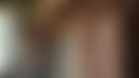 Boho style clothing hanging on a rack.