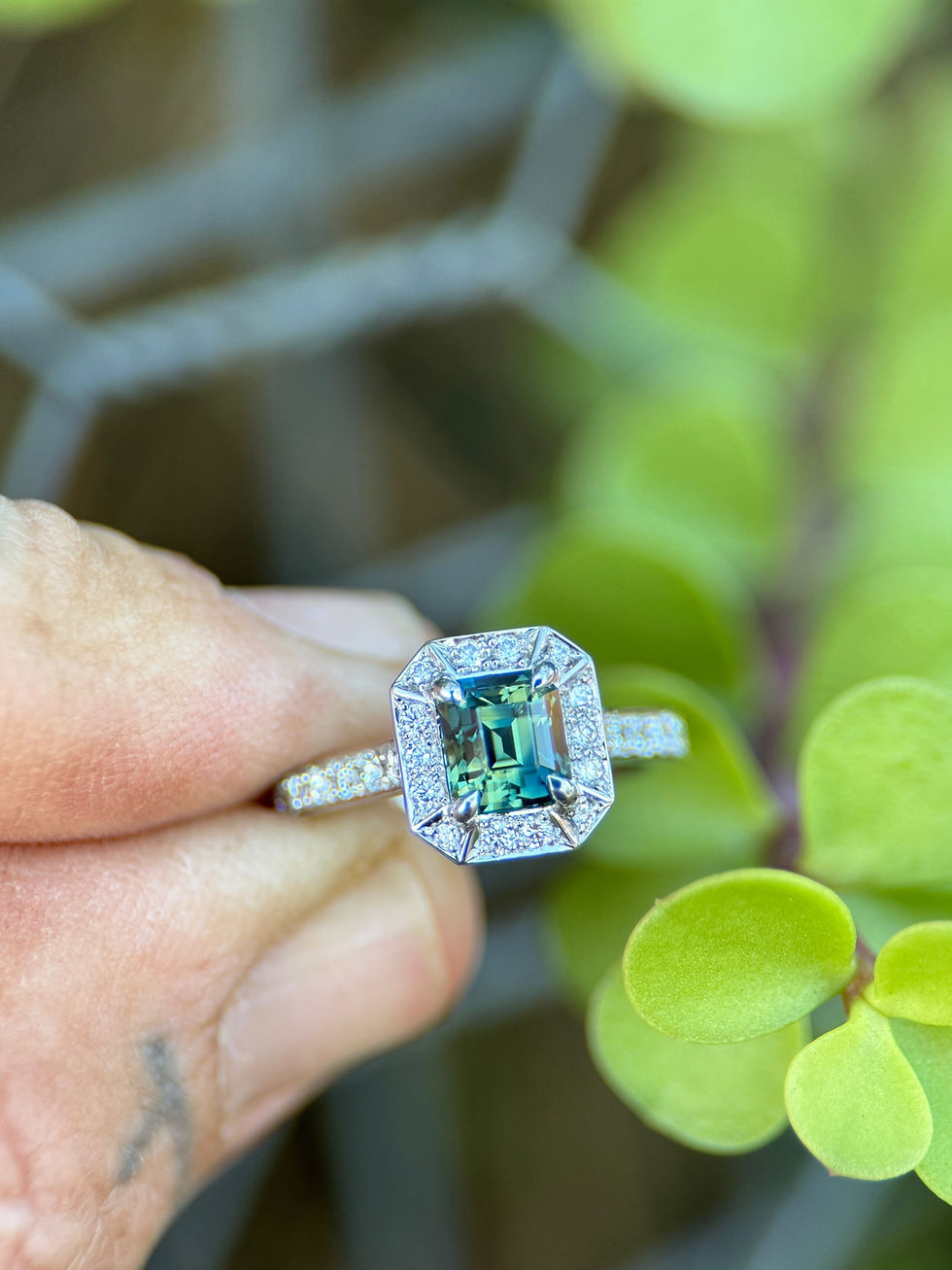 Thumbnail: 1.59ct Emerald cut Blue yellow Australian sapphire set in Art Deco Platinum metal with a natural white diamond halo