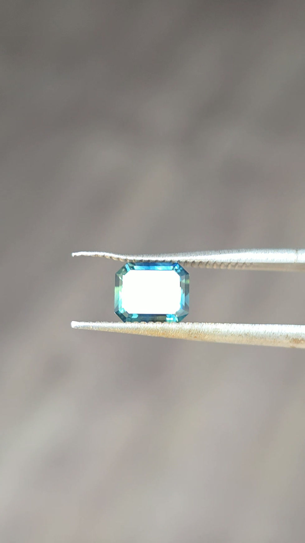 Thumbnail: 1.08ct Emerald cut Blue parti sapphire