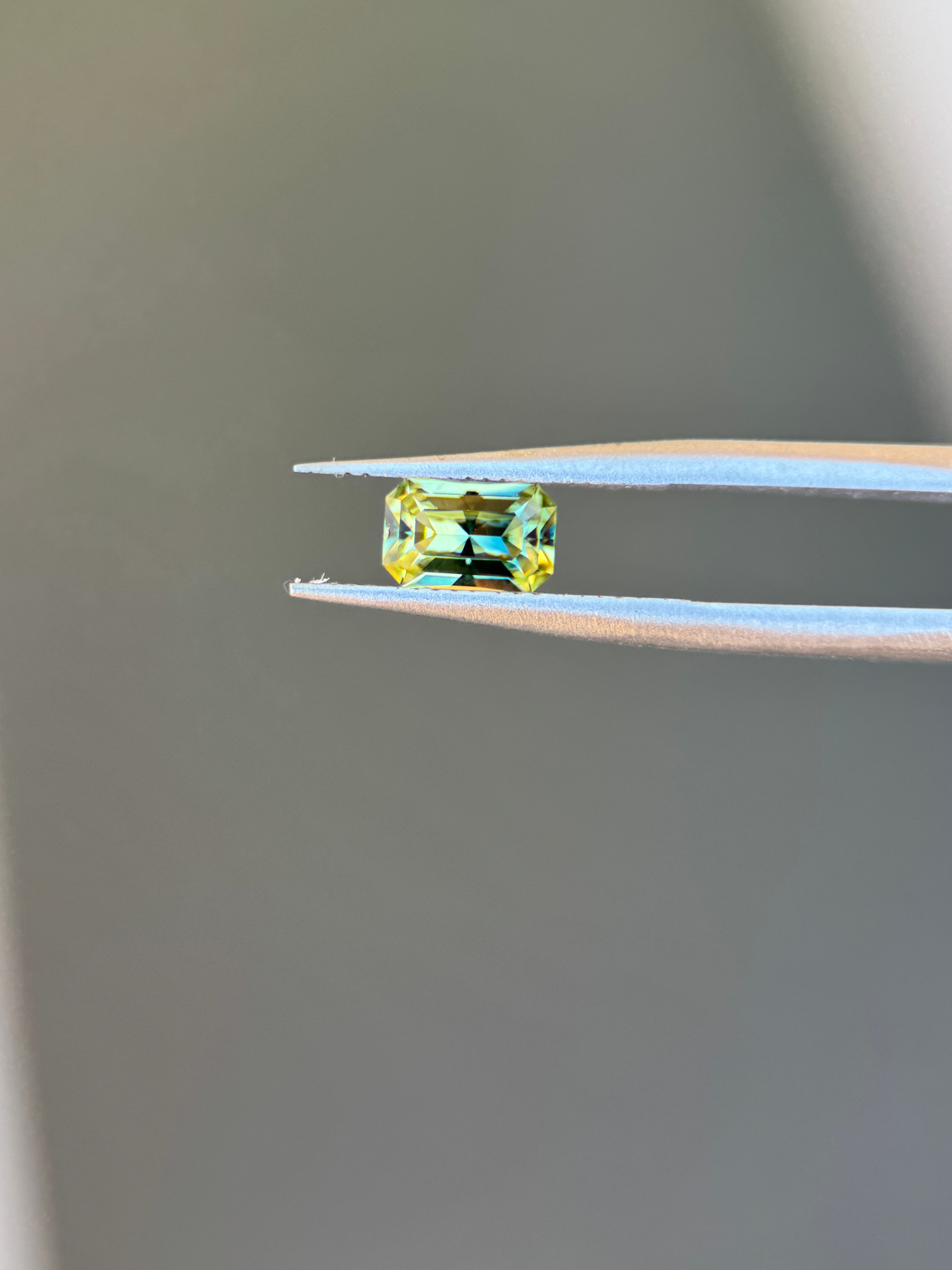 0.85ct Mixed Emerald cut Yellow Blue parti sapphire