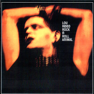 Lou Reed- Rock 'n roll animal (1974) foto del cantante truccato a braccia alzate
