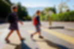 kids-with-backpacks-cross-road-crosswalk-way-school-child-safety-education.jpg