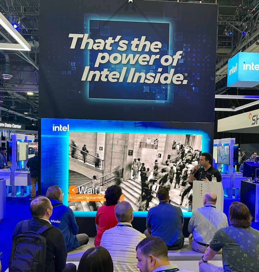 WaitTime Founder, Zack Klima, presenting on stage at the Intel Booth