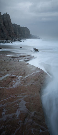 Portugal - Silver Coast moody sky with longexposure and dramatic cliffs.