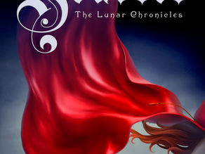 The cover of "Scarlet" by Marissa Meyer, featuring a red cape flowing and a glimpse of a girl's red hair in front of a dark blue, cloudy background.
