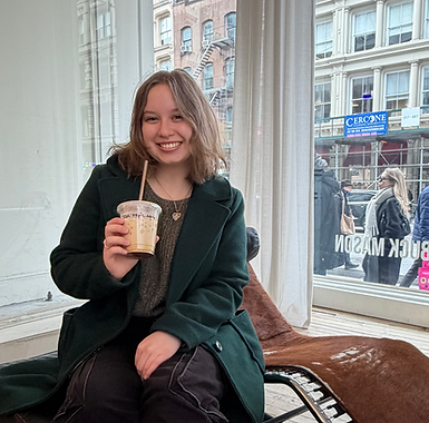 me in green coat at buck mason.HEIC