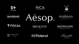 A luxury brand curation index for ÜLRIC atelier lounge, featuring logos for Aesop oral care, Focal audio engineering, Roland digital instruments, Sanremo coffee machines, Bresciani 1970 Italian socks, Dents driving gloves, Pasotti luxury umbrellas, S+ Haircare, Rica, Mühle, Mokann Cosmetics, and Sachajuan