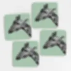 Melamine coasters with a print of a hand-drawn illustrated giraffe on a green background.