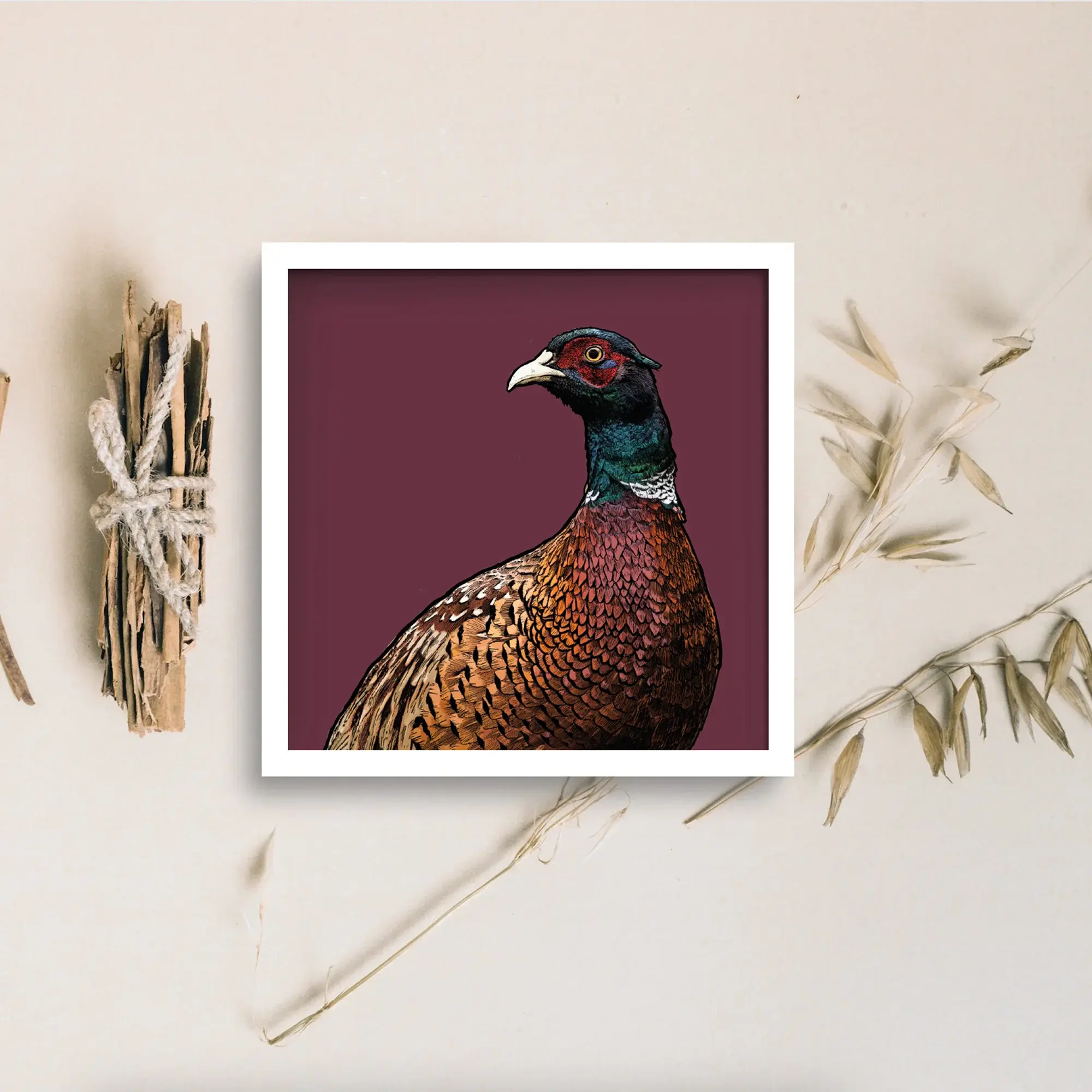 Framed print of illustrated pheasant on purple background.
