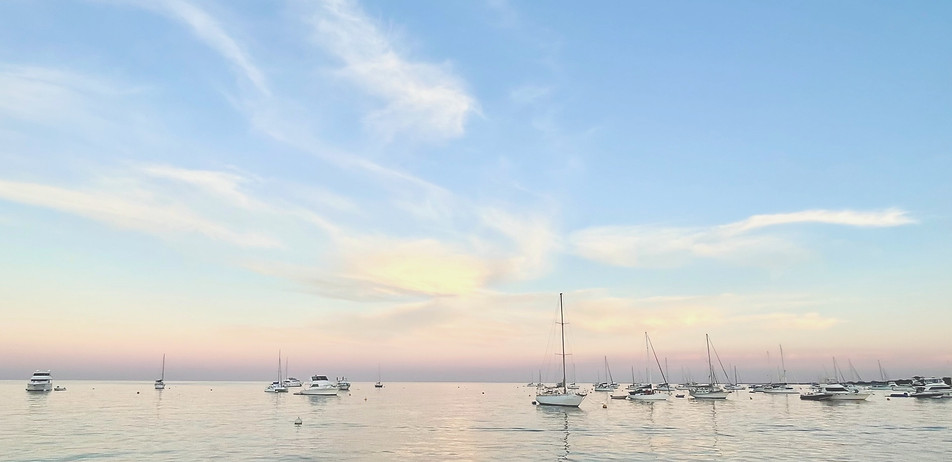 boats and yachts moored on calm water boat gauges australia