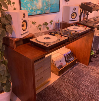 Custom built DJ setup for turntables, speakers, and vinyl records