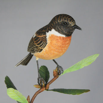 Stonechat bird carving 