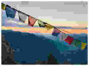 Sunset and prayer flags at the Refuge du Grenairon