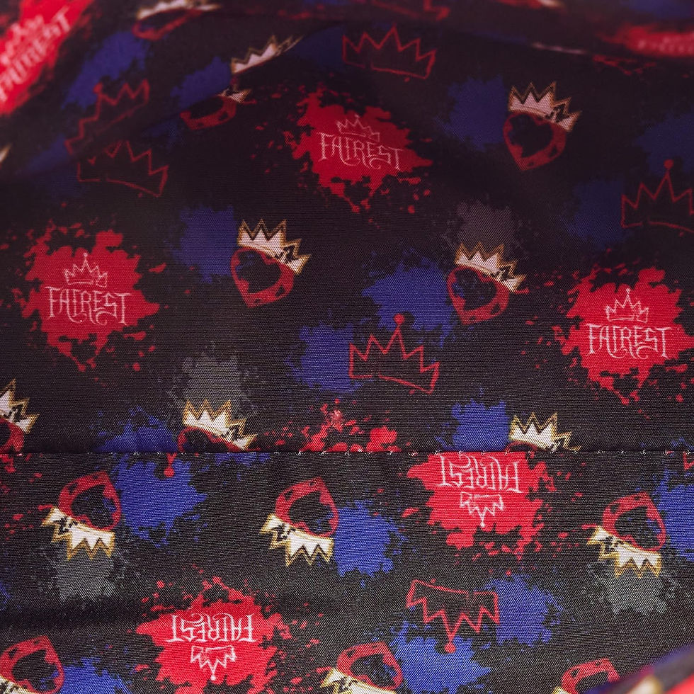 Thumbnail: Interior of Loungefly Descendants Evie crossbody bag with printed lining
