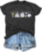 Black fairy tale-inspired graphic t-shirt featuring a castle scene and enchanted characters.