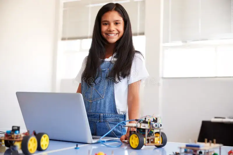 Man working on a laptop with a sunset backdrop, surrounded by plants and books. Warm, vibrant colors create a serene, focused mood.