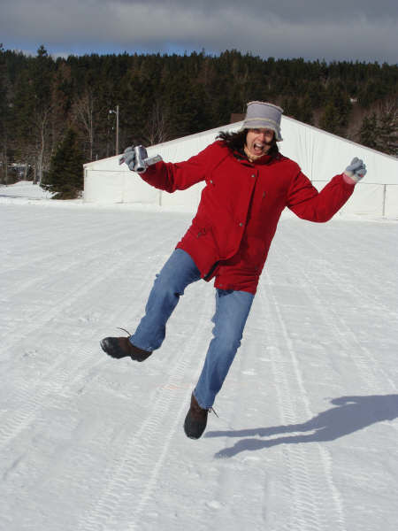 Me taking flight in front of the Silver Dart tent on the ice, February 2009. (Photo by Simone Carmichael)