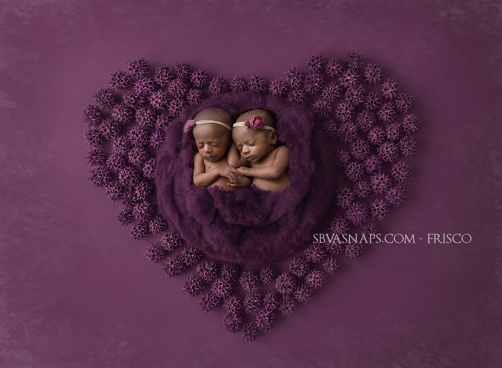 Twin newborn girls