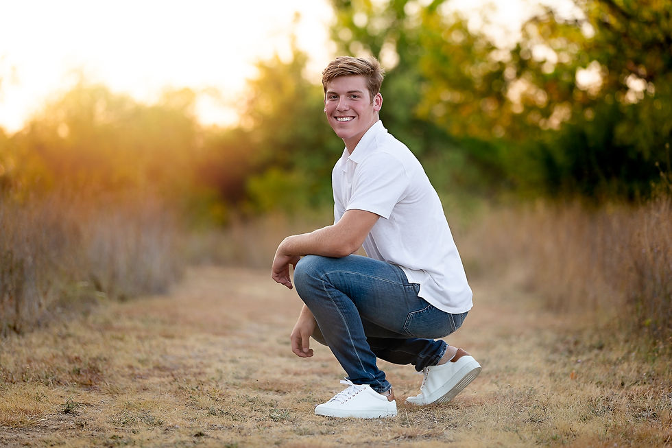 high school senior boy poses